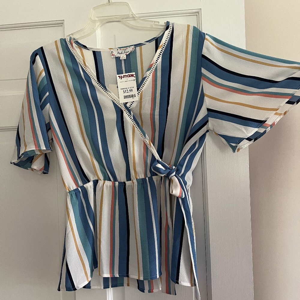 **NEW WITH TAGS** Women’s peplum blouse